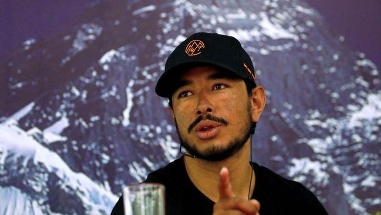 Nirmal Purja, attempting a record to climb fourteen 8000-meter mountain peaks in seven months speaks during a news conference after climbing six mountains including Mt. Everest in Kathmandu