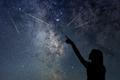 Silhouette,Of,Young,Girl,Watching,Meteor,Shower.