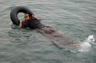 Migrants cross into the Spanish enclave of Ceuta