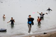 Migrants cross into the Spanish enclave of Ceuta