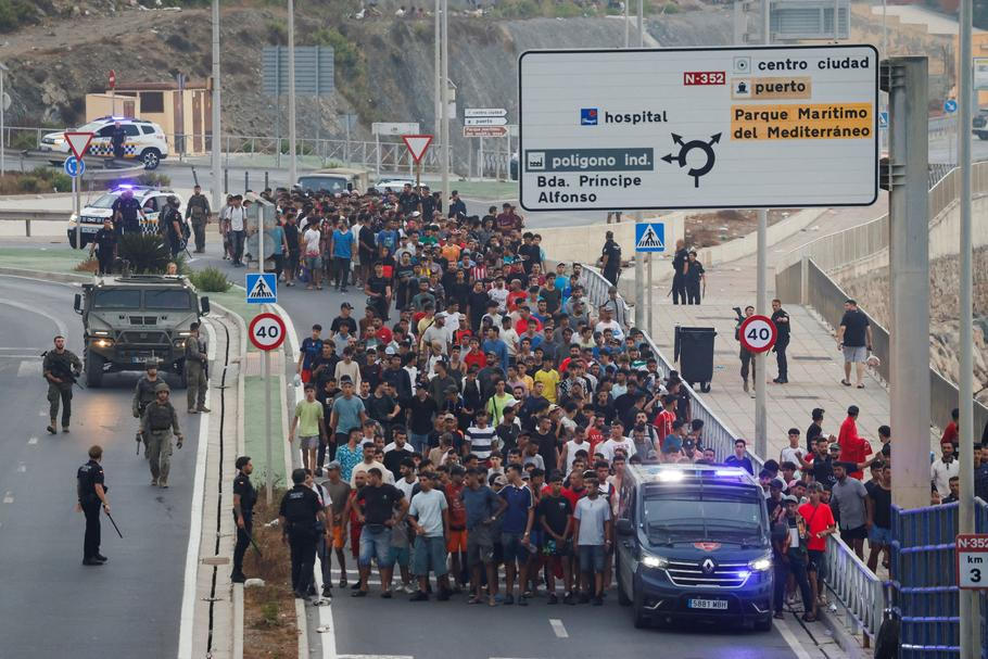 Mass crossings of migrants on foot and by sea from Morocco into Spanish territory, in Ceuta