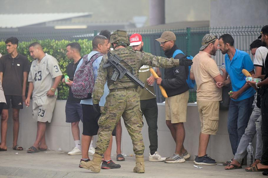 Mass crossings of migrants on foot and by sea from Morocco into Spanish territory, in Ceuta