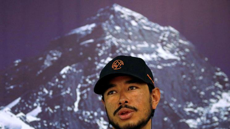 Nirmal Purja, attempting a record to climb fourteen 8000-meter mountain peaks in seven months speaks during a news conference after climbing six mountains including Mt. Everest in Kathmandu