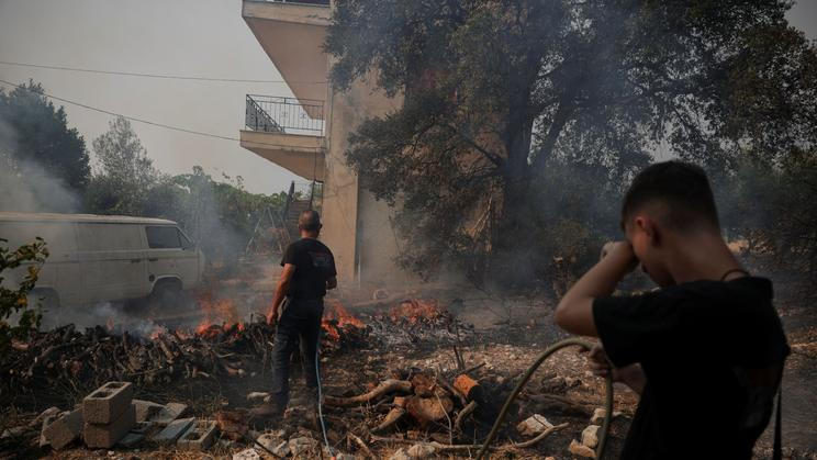 Wildfire burns in Greece