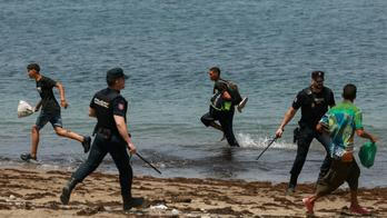 Mass crossings of migrants on foot and by sea from Morocco into Spanish territory, in Ceuta