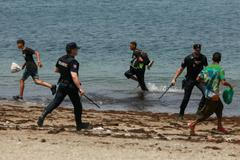 Mass crossings of migrants on foot and by sea from Morocco into Spanish territory, in Ceuta