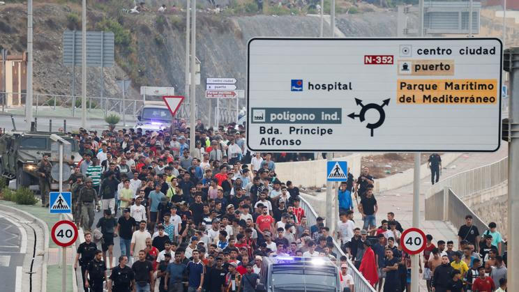 Mass crossings of migrants on foot and by sea from Morocco into Spanish territory, in Ceuta
