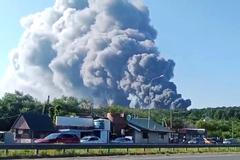 Smoke rises after a Ukrainian drone attack on a Wildberries warehouse, in Novosemeykino