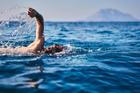 Swimmer,Training,On,The,Open,Sea,/,Ocean.