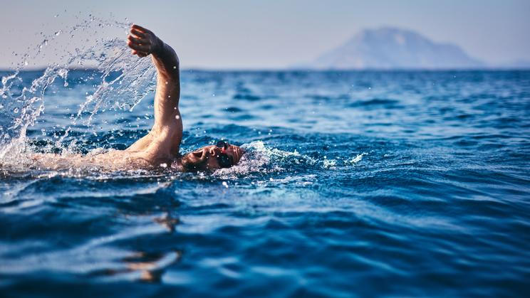 Swimmer,Training,On,The,Open,Sea,/,Ocean.