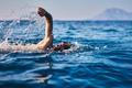 Swimmer,Training,On,The,Open,Sea,/,Ocean.