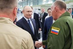 Russian President Vladimir Putin visits an aviation plant in Irkutsk