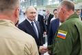 Russian President Vladimir Putin visits an aviation plant in Irkutsk