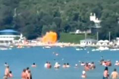 A screengrab from a video obtained from social media shows the moment of a drone strike on a beach, at the holiday village of Arkhipo-Osipovka, Gelendzhik resort area