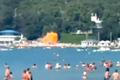 A screengrab from a video obtained from social media shows the moment of a drone strike on a beach, at the holiday village of Arkhipo-Osipovka, Gelendzhik resort area