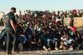 Mass crossings of migrants on foot and by sea from Morocco into Spanish territory, in Ceuta