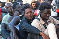 Mass crossings of migrants on foot and by sea from Morocco into Spanish territory, in Ceuta