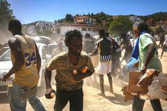 Mass crossings of migrants on foot and by sea from Morocco into Spanish territory, in Ceuta