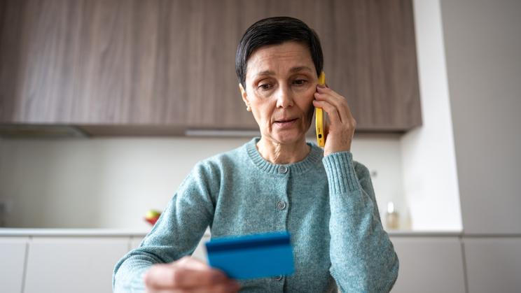 Financial,Phone,Scam.,Nervous,Stressed,Frightened,Woman,Sending,Money,To