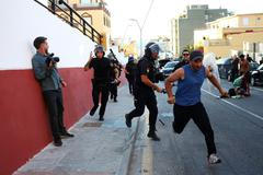 Mass crossings of migrants on foot and by sea from Morocco into Spanish territory, in Ceuta