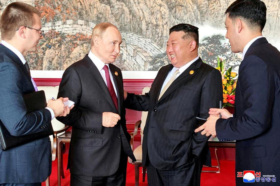 FILE PHOTO: North Korean leader Kim Jong Un meets Russian President Vladimir Putin in Beijing