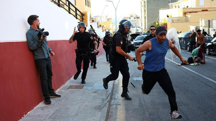Mass crossings of migrants on foot and by sea from Morocco into Spanish territory, in Ceuta