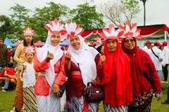 Malang,,August,12,,2024.,Indonesian,People,Wearing,Red,Shirts,While