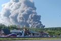 FILE PHOTO: Smoke rises after a Ukrainian drone attack on a Wildberries warehouse, in Novosemeykino