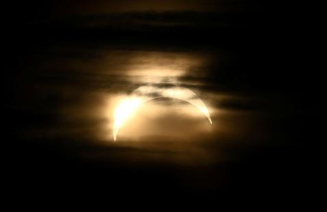 A partial solar eclipse is seen from Observatorielunden in central Stockholm