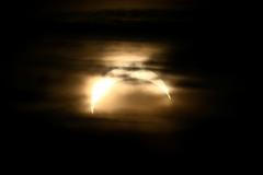A partial solar eclipse is seen from Observatorielunden in central Stockholm