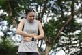 Women,Experiencing,Severe,Abdominal,Pain,Outdoors,,Possibly,Due,To,Stomach