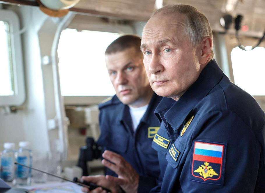 Russian President Vladimir Putin observes a military drill of Pacific fleet in Sakhalin region