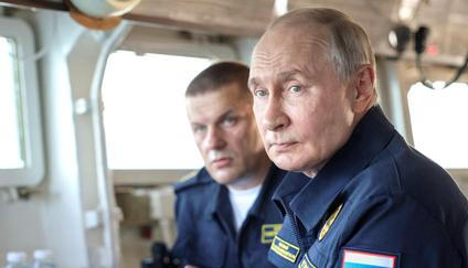 Russian President Vladimir Putin observes a military drill of Pacific fleet in Sakhalin region