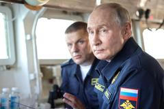 Russian President Vladimir Putin observes a military drill of Pacific fleet in Sakhalin region