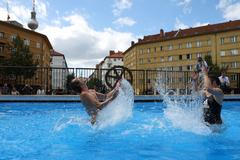 Berlin's Volksbuehne theatre install a temporary public swimming pool outside its building at Rosa-Luxemburg-Platz