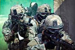 U.S. Army paratroopers assigned to the 1st Battalion, 508th Parachute Infantry Regiment, 82nd Airborne Division prepare to enter a building as they conduct close-quarters combat training during an air assault mission September 26, 2013 at Fort Bragg, NC.