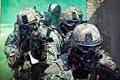 U.S. Army paratroopers assigned to the 1st Battalion, 508th Parachute Infantry Regiment, 82nd Airborne Division prepare to enter a building as they conduct close-quarters combat training during an air assault mission September 26, 2013 at Fort Bragg, NC.