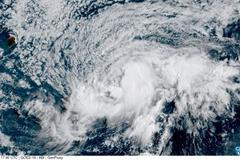 A satellite image shows the tropical storm Lala over the Pacific Ocean