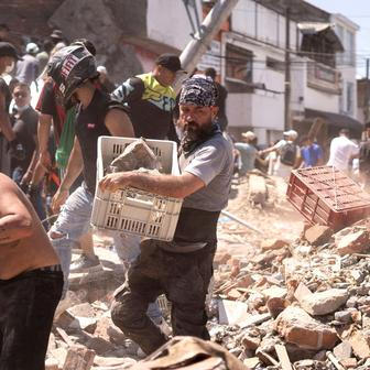 Collapsed buildings in Cali after earthquake strikes Colombia