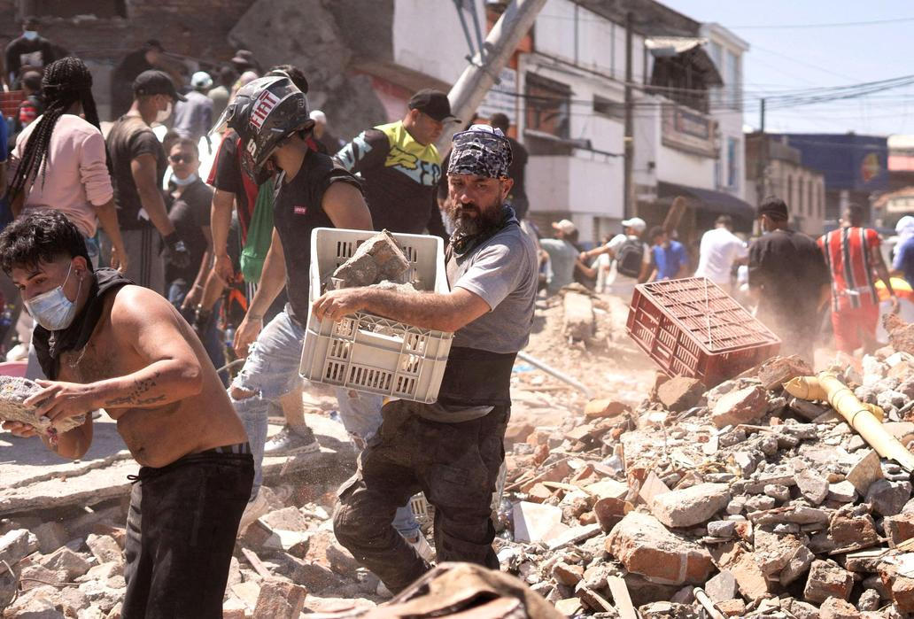 Collapsed buildings in Cali after earthquake strikes Colombia