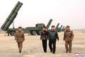 North Korean leader Kim oversees test-launch of multiple rocket launchers