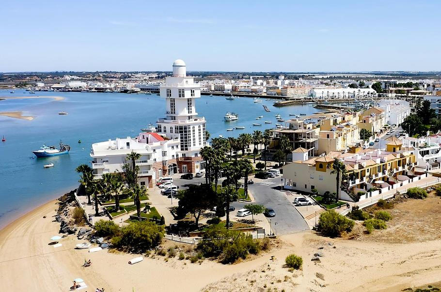 Aerial,View,Over,The,Village,And,Fishing,Port,Of,Isla