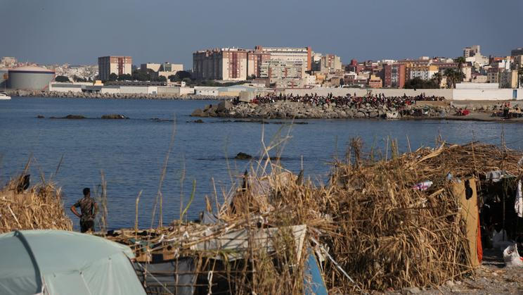 Moroccan migrants shelter in makeshift camp along Ceuta shoreline