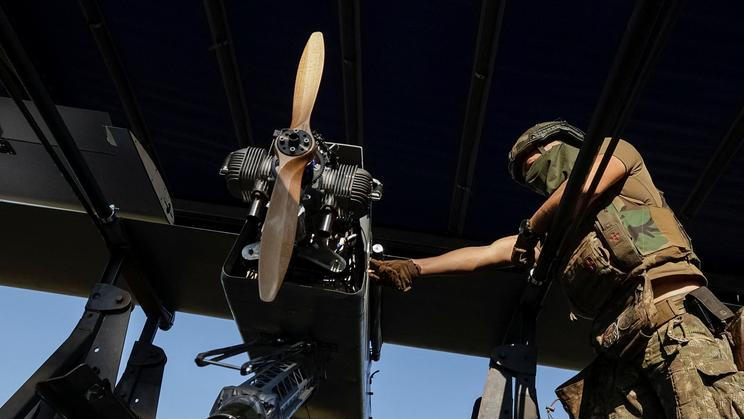 Ukrainian serviceman prepares to launch a FP-2 middle strike drone towards Russian troops in Kharkiv region