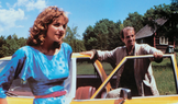 Kim Cattrallová s Jean-Paulem Belmondem ve filmové krimi komedii Bezva finta (1985).