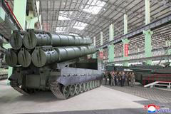 North Korean leader Kim Jong Un inspects the production of new artillery