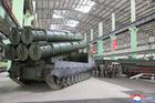 North Korean leader Kim Jong Un inspects the production of new artillery