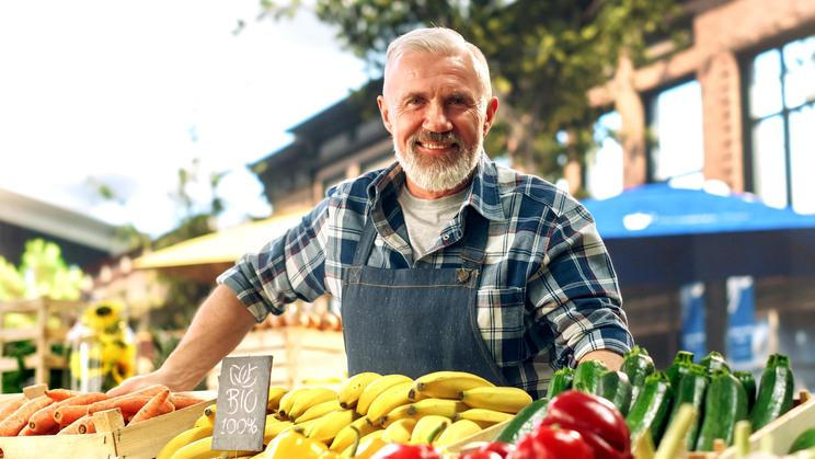 Successful,Senior,Farmer,Posing,And,Cheerfully,Smiling,For,Camera.,Middle