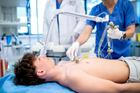 Preoperative,Ekg,Examination,Of,Teenage,Patient,In,Hospital,Setting.