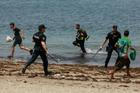 FILE PHOTO: Mass crossings of migrants on foot and by sea from Morocco into Spanish territory, in Ceuta